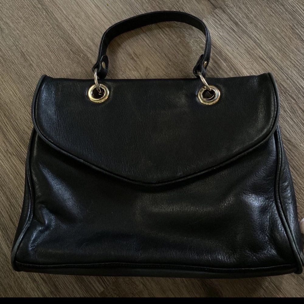 Classic Wilson’s Black Leather Top-Handle Bag